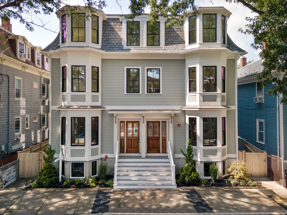 New cladding and siding on 3 decker house in Cambridge MA