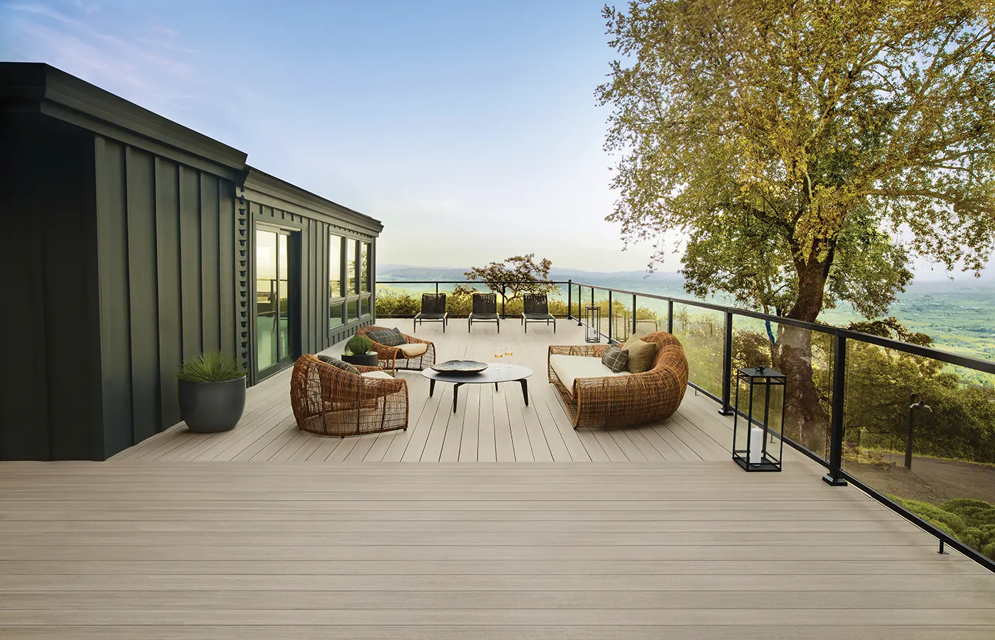 aerial-view-of-the-commercial-decking-with-glass-railing-and-outdoor-furniture