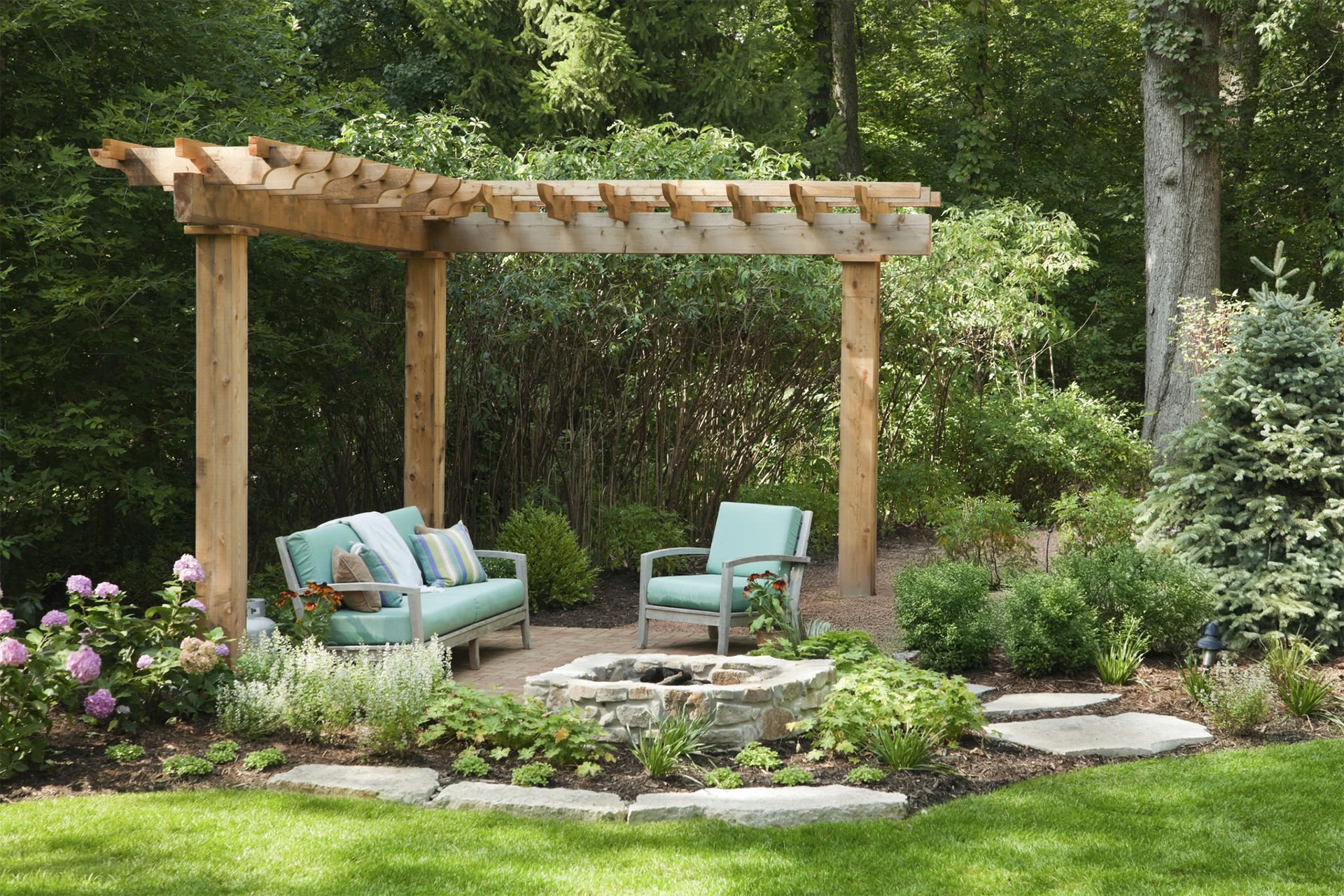 classic-pergola-with-outdoor-living-space-with-firepit-featuring-overlooking-forest-view