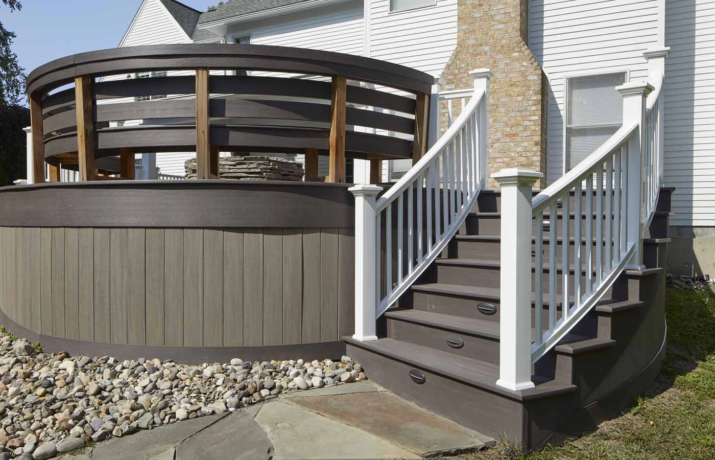 coastline-mahogany-dark-hickory-vintage-decking-with-white-railing-featuring-outdoor-firepit
