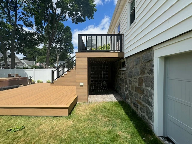 elevated-residential-deck-with-storage-and-black-aluminum-railing