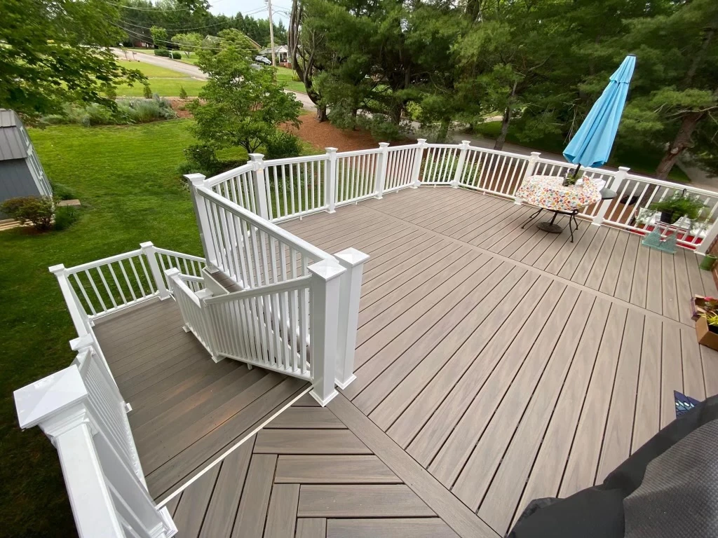 hard-wood-deck-with-white-deck-railing-featuring-nature-scenery