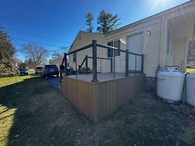 hard-wood-residential-deck-with-skirting-and-wire-railing