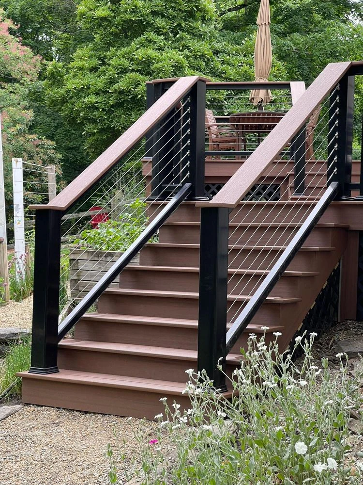 multi-level-deck-with-wire-railing-and-outdoor-furniture