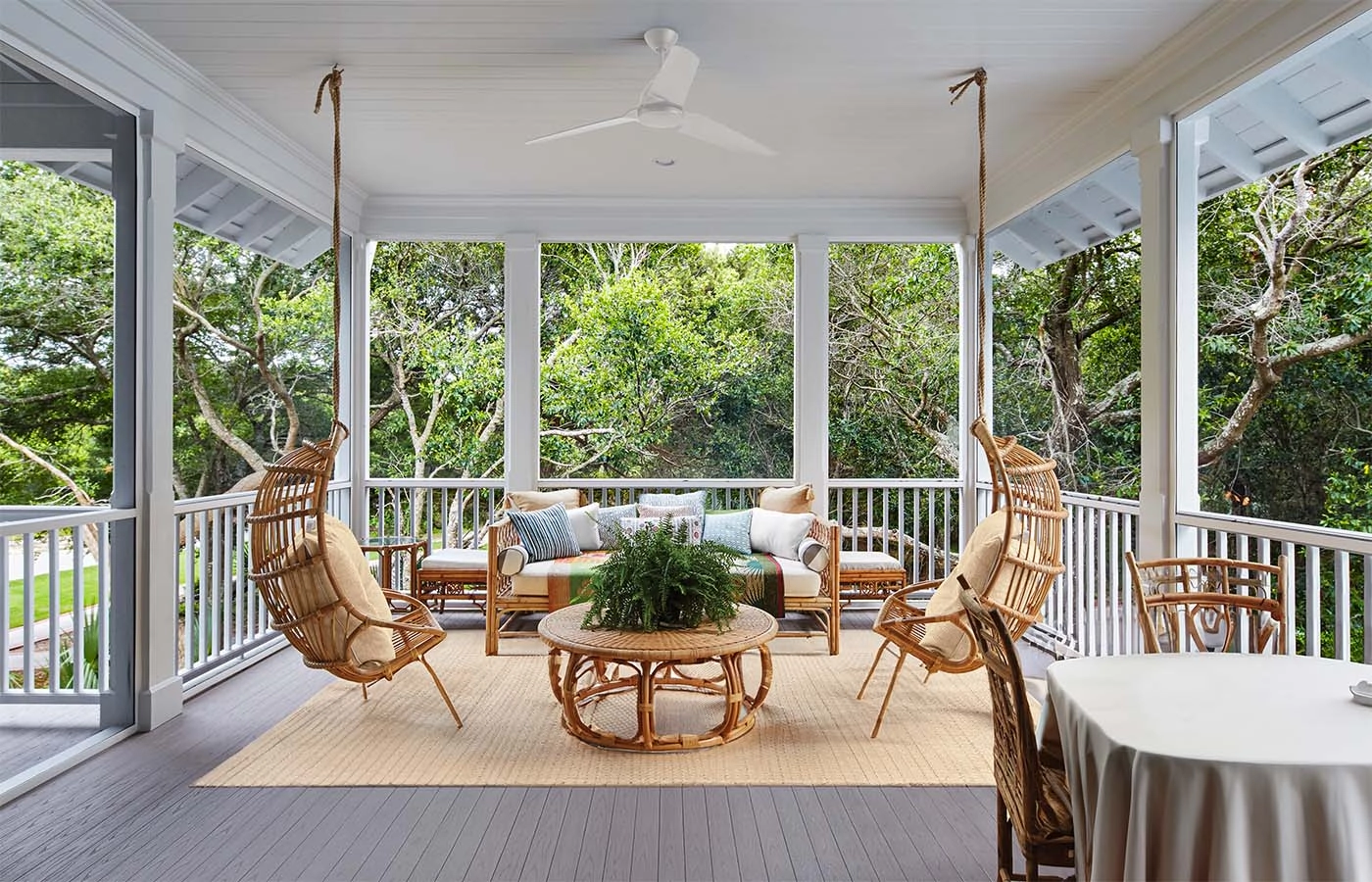 porch-with-open-area-with-furniture-and-white-railing