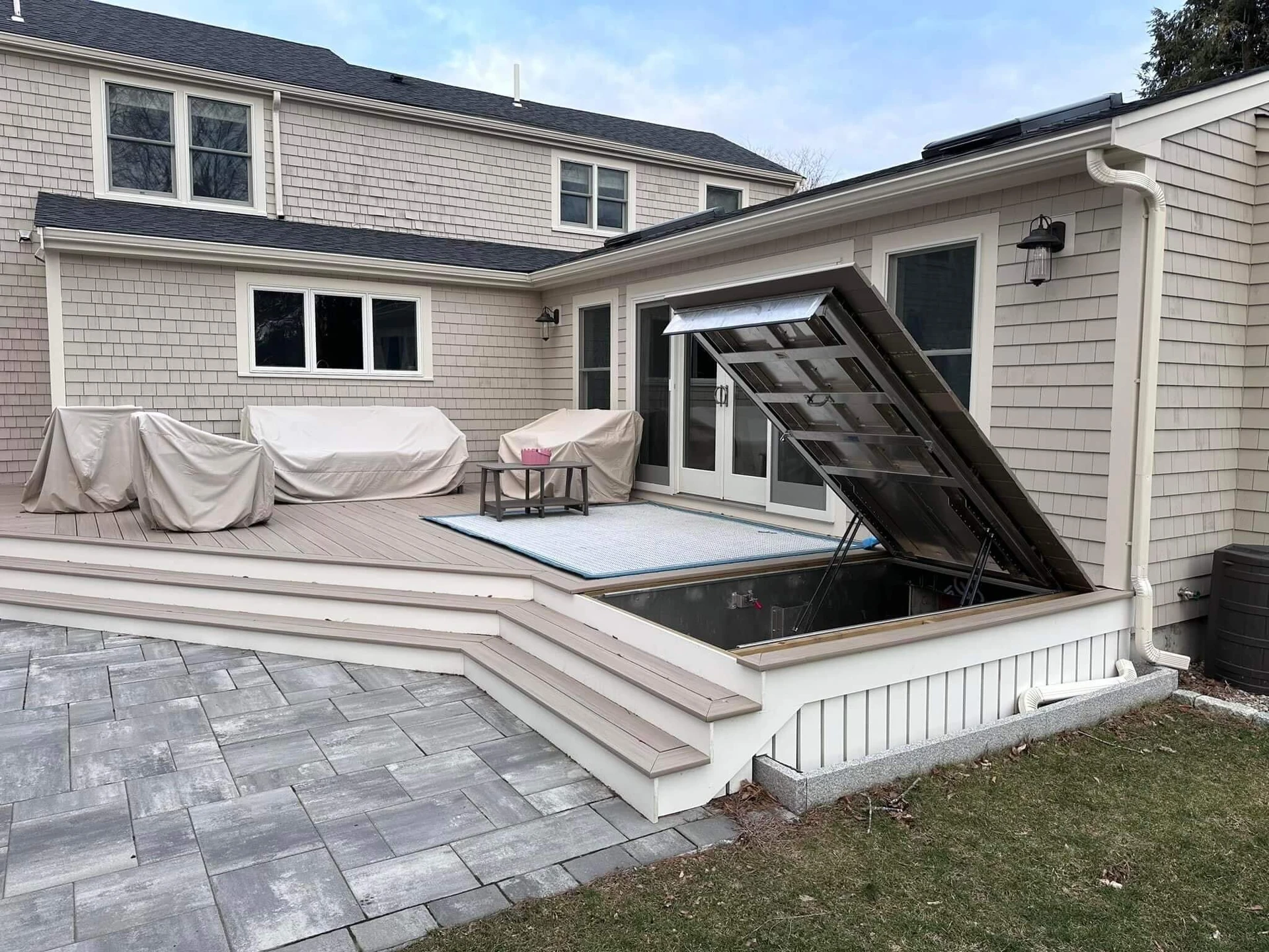residential-deck-with-deck-basement-and-covered-furniture
